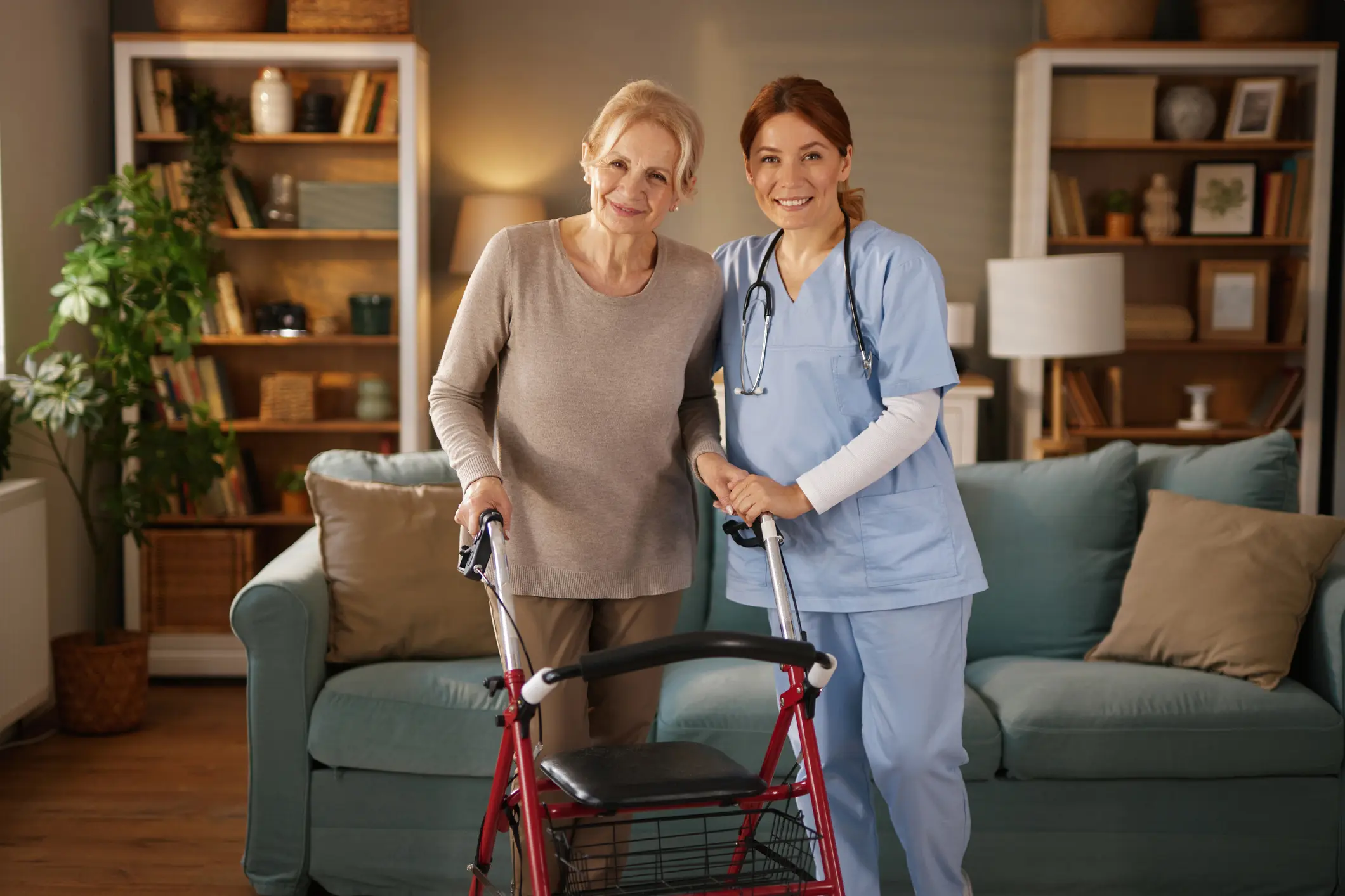 Nurse assisting senior woman at home