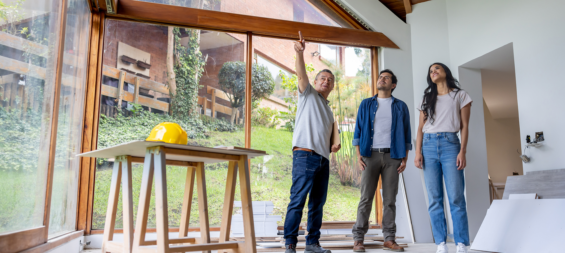 Homeowners reviewing building project indoors